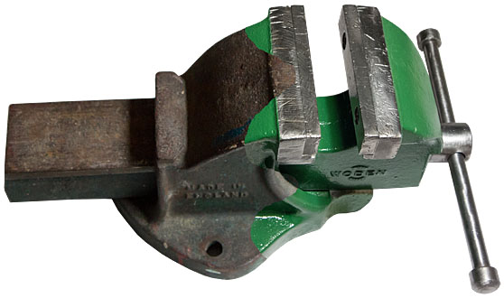 Before and after composite photo of bench vise