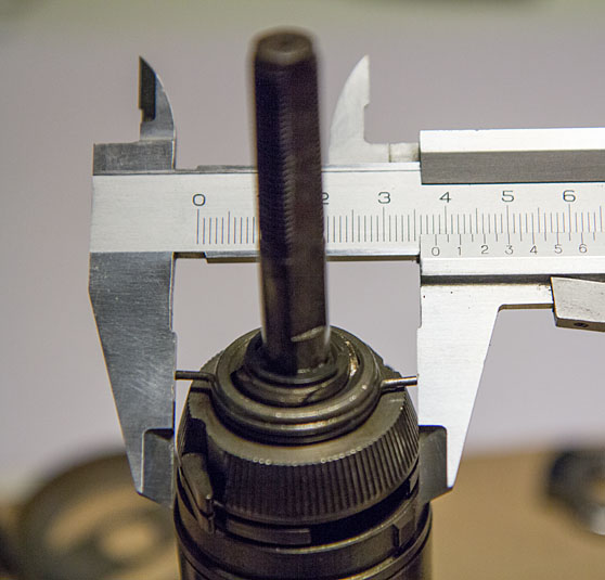 Measuring old style friction spring reach